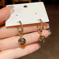 Angled view of the 14K Gold-Plated Elegant Rhinestone Ball Earrings
