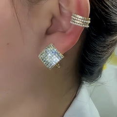 Model showcasing the dangle and style of the 14K Gold-Plated Elegant Shiny Zircon Diamond Stud Earrings