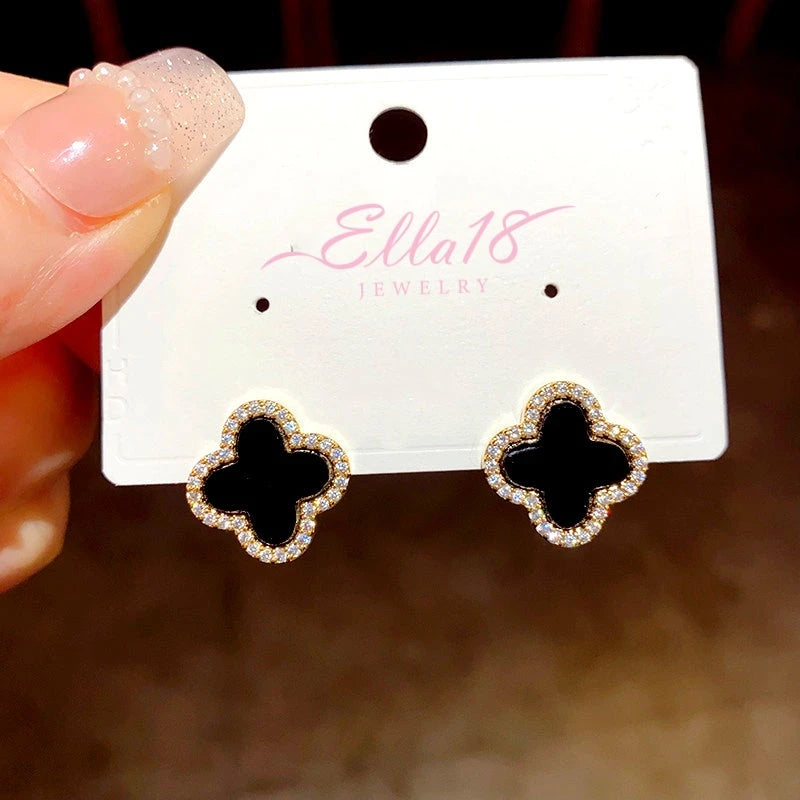 Angled view of the 14K Gold-Plated Elegant Simple Flower Stud Earrings