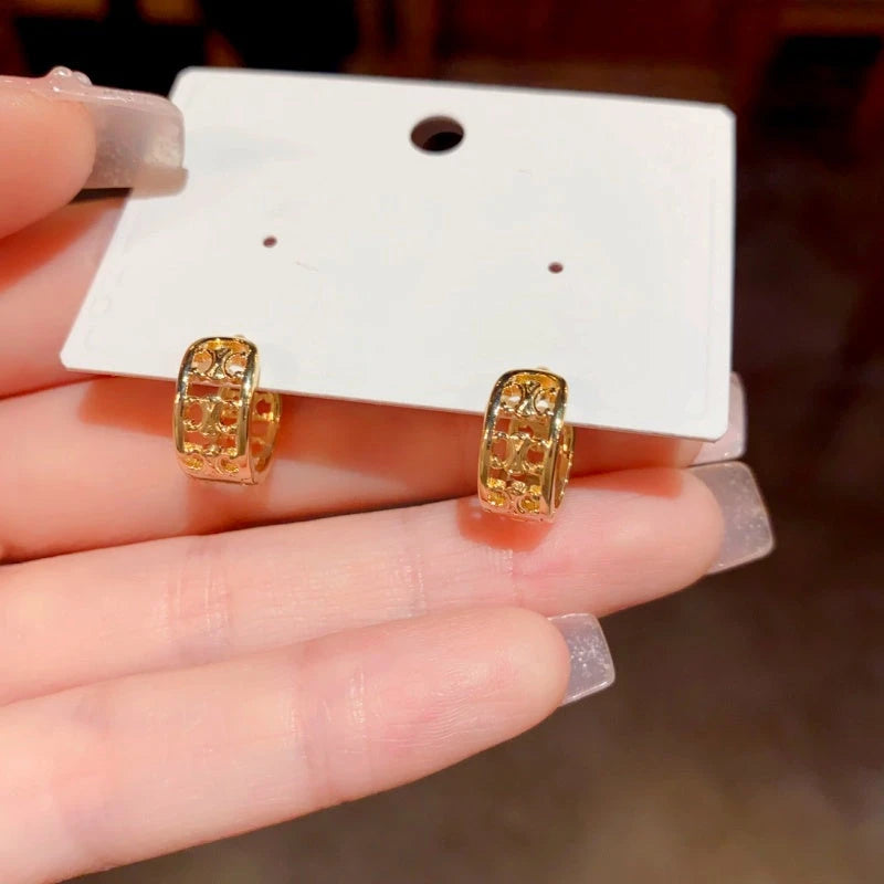 Close-up detail of the sparkling zircons and plating on the Small Hoop Earrings