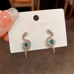 Angled view of the 14K Gold-Plated Elegant Snake-Shaped Green Square Diamond Earrings