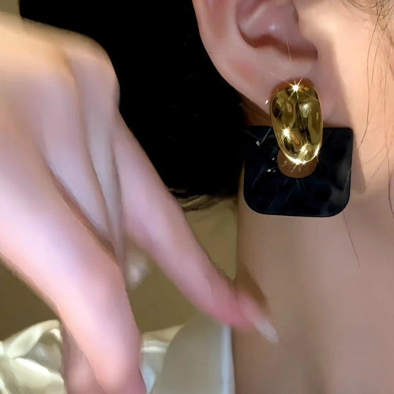 Close-up detail of the sparkling zircons and plating on the Contrasting Color Earrings