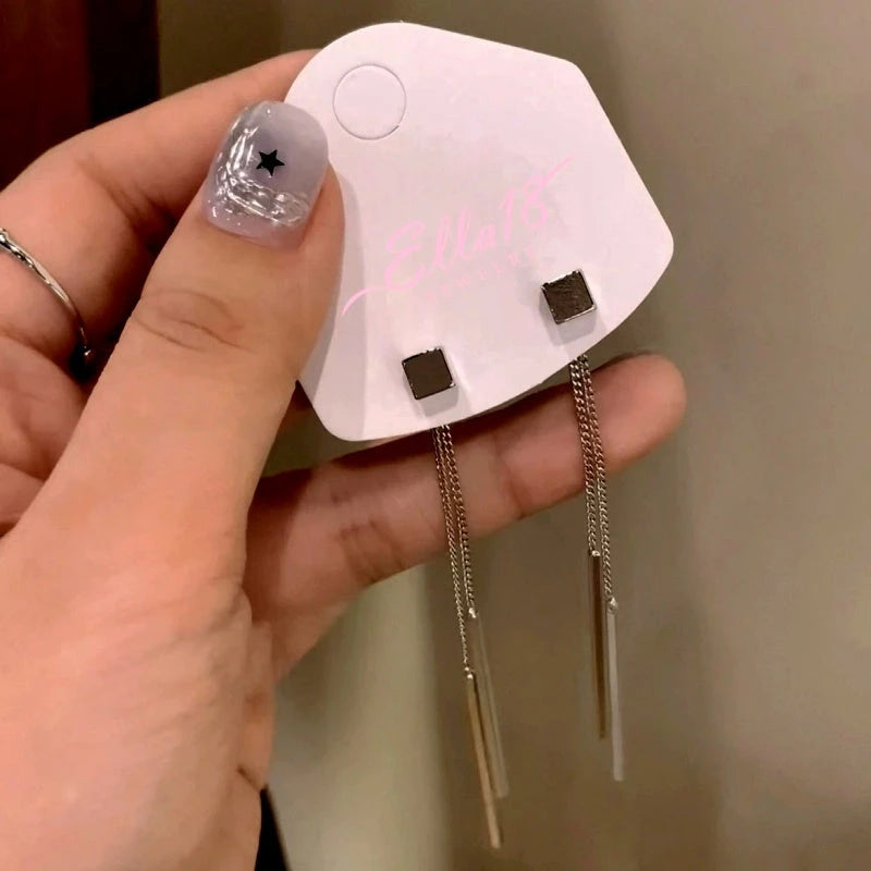 Close-up detail of the sparkling zircons and plating on the Square Tassel Earrings