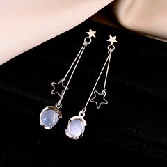Angled view of the 14K Gold-Plated Elegant Star Cat's Eye Bead Tassel Earrings
