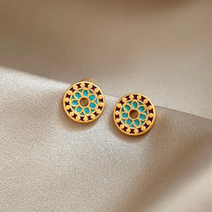 Close-up detail of the sparkling zircons and plating on the Blue Gold Studs