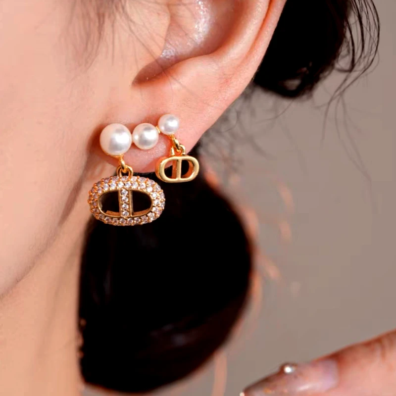 Close-up detail of the sparkling zircons and plating on the Pearl Tassel Earrings