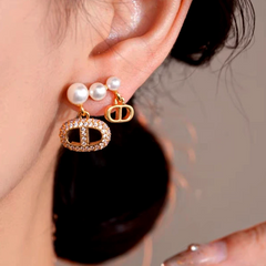 Close-up detail of the sparkling zircons and plating on the Pearl Tassel Earrings