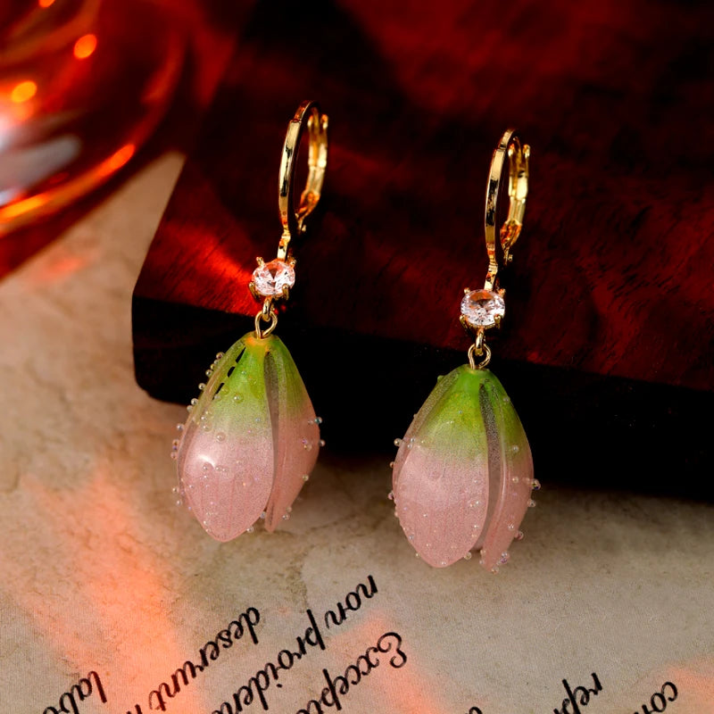 Close-up detail of the sparkling zircons and plating on the Tulip Flower Earrings