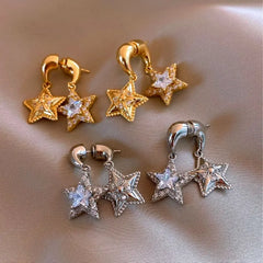 Close-up detail of the sparkling zircons and plating on the Multi-Layer Star Earrings