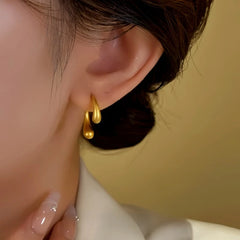 Close-up detail of the sparkling zircons and plating on the Water Drop Earrings