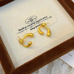 Angled view of the 14K Gold-Plated Elegant Two-Pieces Water Drop Earrings