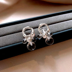 Close-up detail of the sparkling zircons and plating on the Silver Water Drop Earrings