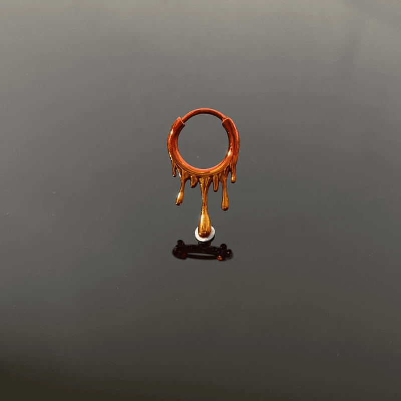 Angled view of the 14K Gold-Plated Elegant Water Drop Earrings