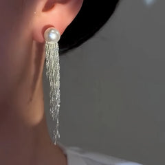 Close-up detail of the sparkling zircons and plating on the Waterfall Pearl Earrings