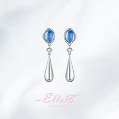 Close-up detail of the sparkling zircons and plating on the Aquamarine Drop Earrings