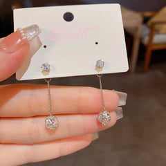 Close-up detail of the sparkling zircons and plating on the Ball Tassel Earrings