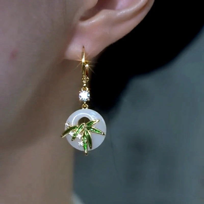 Close-up detail of the sparkling zircons and plating on the Bamboo Leaf Earrings