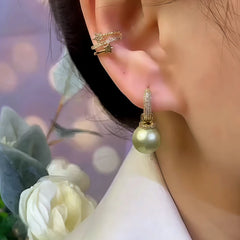 Close-up detail of the sparkling zircons and plating on the Zircon Drop Earrings