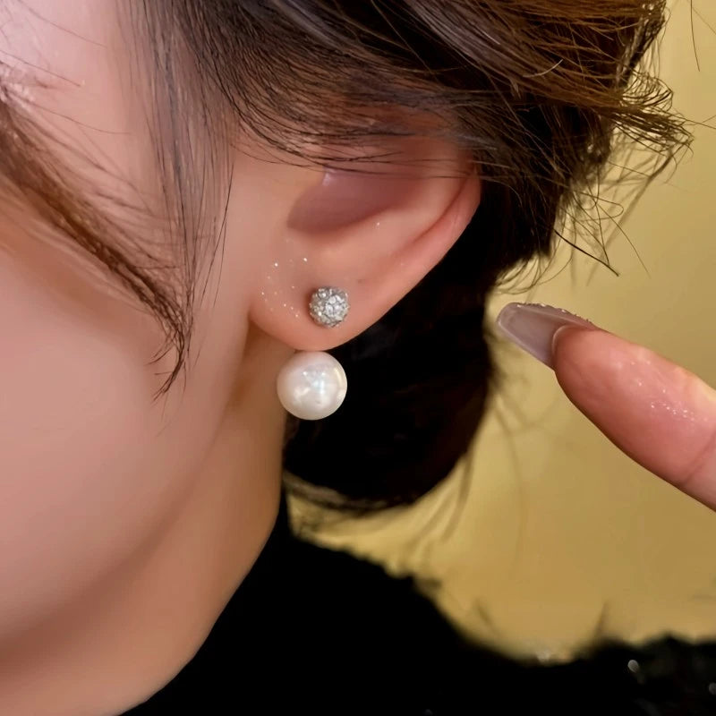 Close-up detail of the sparkling zircons and plating on the Zircon Jacket Earrings