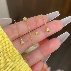 Close-up detail of the sparkling zircons and plating on the Bean Threader Earrings