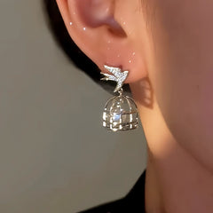 Close-up detail of the sparkling zircons and plating on the Birdcage Earrings