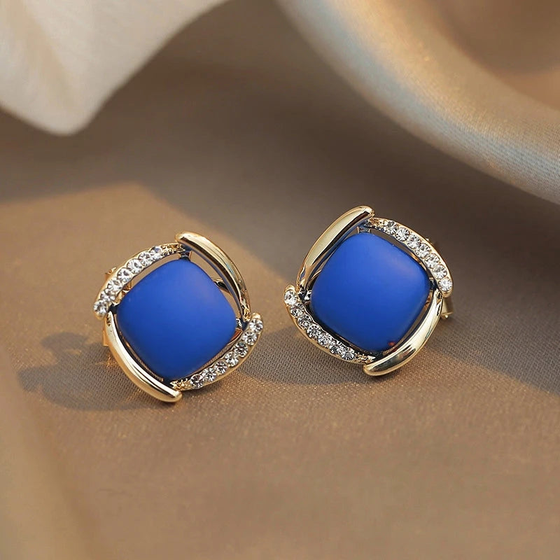 Close-up detail of the sparkling zircons and plating on the Blue Square Studs