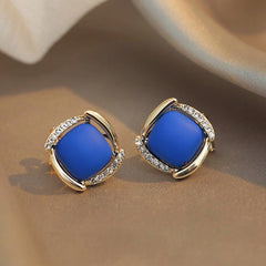 Close-up detail of the sparkling zircons and plating on the Blue Square Studs