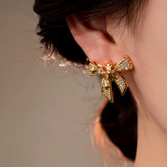 Close-up detail of the sparkling zircons and plating on the Zircon Bow Studs
