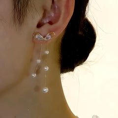 Close-up detail of the sparkling zircons and plating on the Pearl Tassel Earrings