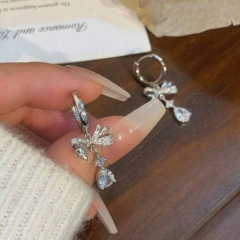 Angled view of the 14K Gold-Plated Elegant Zircon Bow Water Drop Earrings