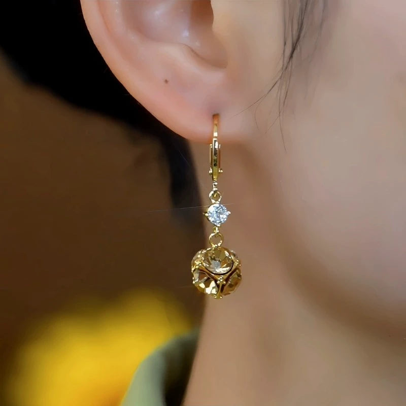 Close-up detail of the sparkling zircons and plating on the Brown Zircon Earrings