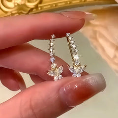 Angled view of the 14K Gold-Plated Elegant Zircon Butterfly Diamond Crawler Earrings