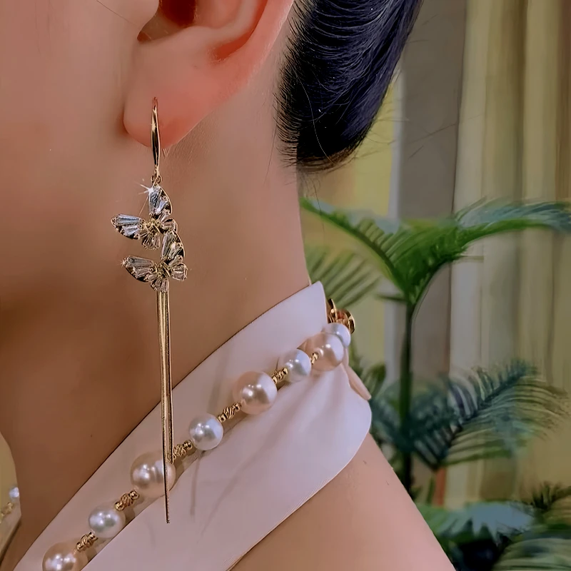 Close-up detail of the sparkling zircons and plating on the Butterfly Tassel Earrings