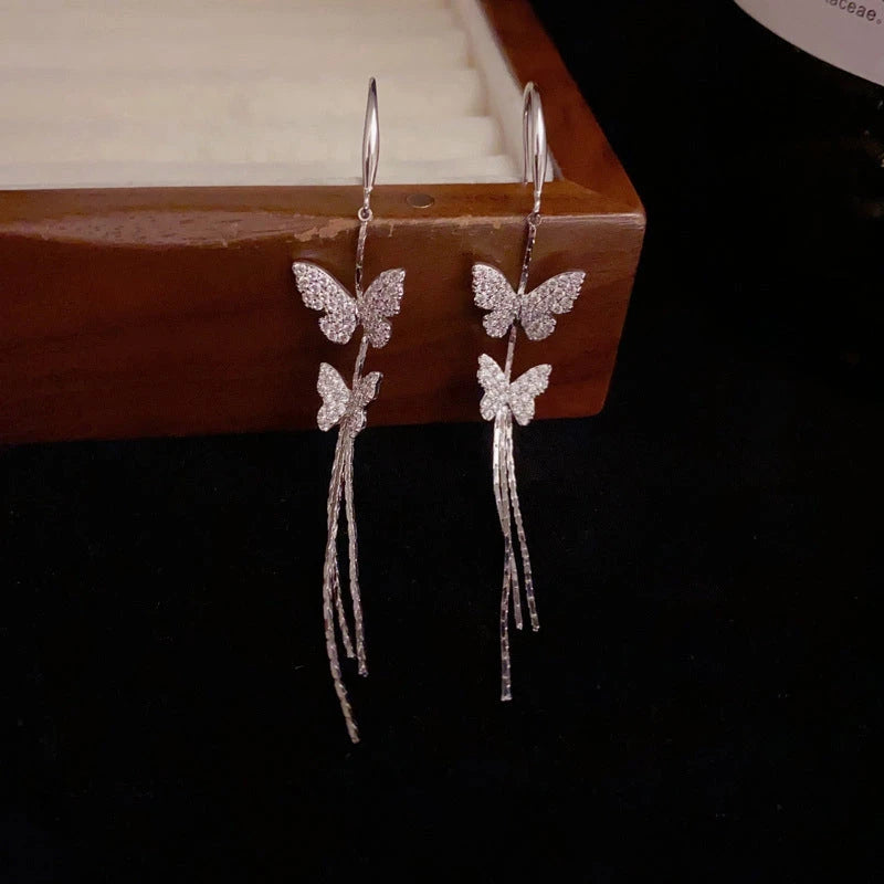 Angled view of the 14K Gold-Plated Elegant Zircon Butterfly Ear Hook Tassel Earrings