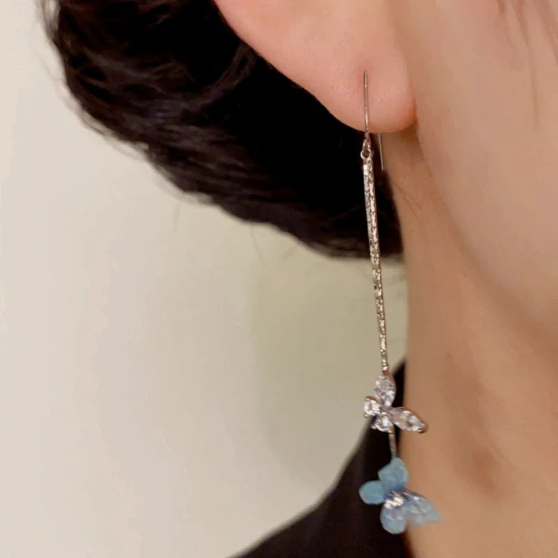 Close-up detail of the sparkling zircons and plating on the Butterfly Ear Hooks