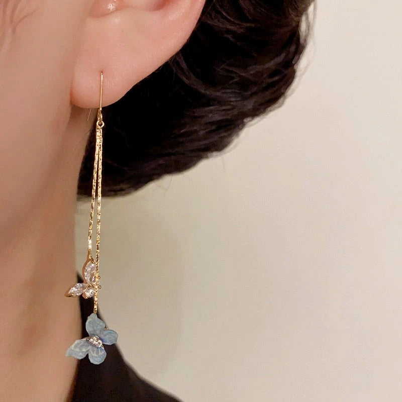 Angled view of the 14K Gold-Plated Elegant Zircon Butterfly Ear Hooks