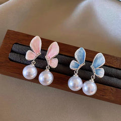 Close-up detail of the sparkling zircons and plating on the Butterfly Pearl Earrings