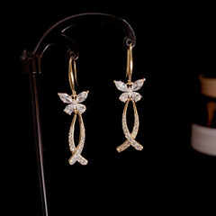 Model showcasing the dangle and style of the 14K Gold-Plated Elegant Zircon Butterfly Tassel Ear Hooks