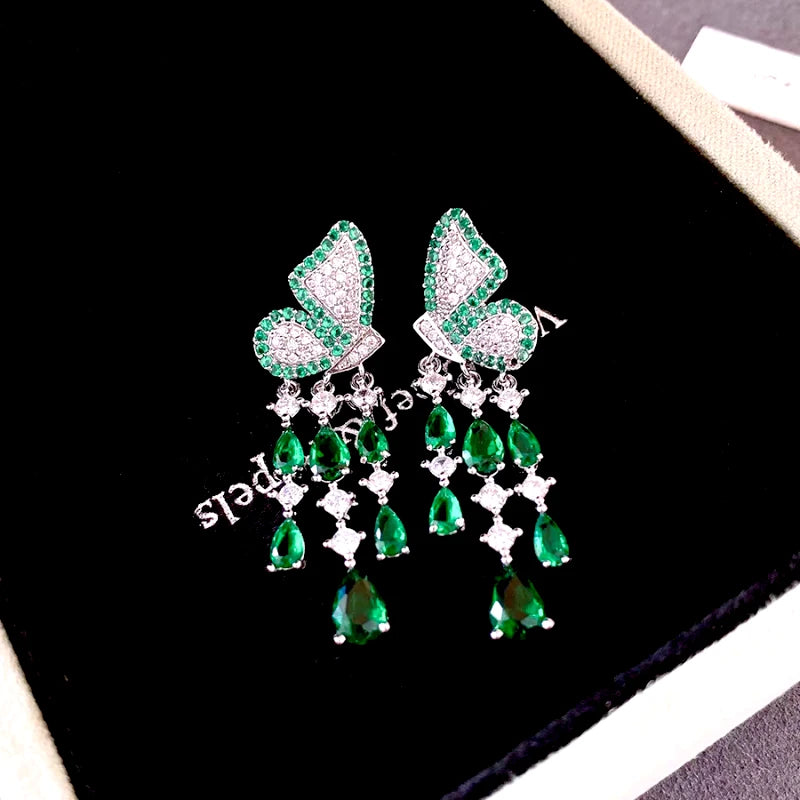 Close-up detail of the sparkling zircons and plating on the Green Butterfly Tassel Earrings