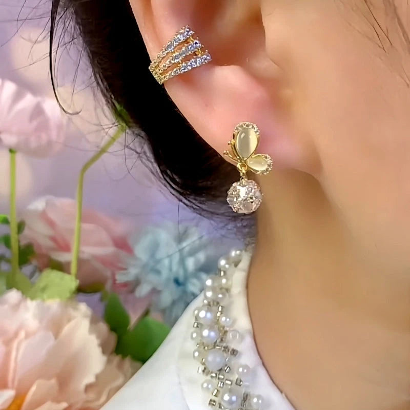 Close-up detail of the sparkling zircons and plating on the Cat's Eye Butterfly Earrings