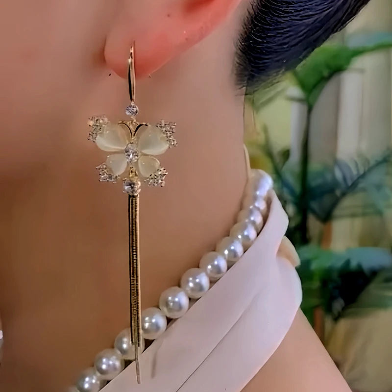 Close-up detail of the sparkling zircons and plating on the Butterfly Tassel Ear Hooks