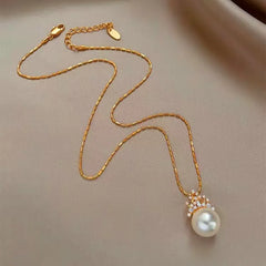 14K Gold-Plated Elegant Zircon Crown Pearl Pendant Necklace worn to showcase its length and pendant detail