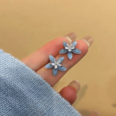 Angled view of the 14K Gold-Plated Elegant Zircon Crystal Flower Stud Earrings