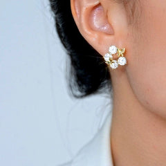 Close-up detail of the sparkling zircons and plating on the Zircon Butterfly Studs