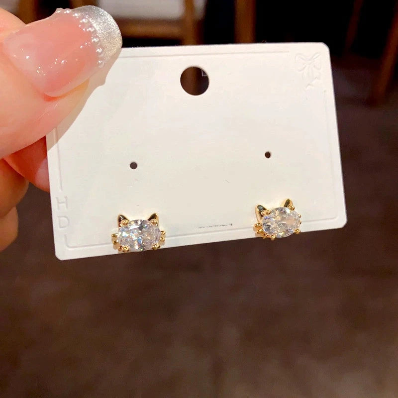 Close-up detail of the sparkling zircons and plating on the Cat Stud Earrings