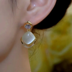 Close-up detail of the sparkling zircons and plating on the Teardrop Earrings