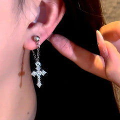 Angled view of the 14K Gold-Plated Elegant Zircon Diamond Cross Tassel Earrings