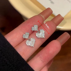 Angled view of the 14K Gold-Plated Elegant Zircon Diamond Double-Layer Bling Heart Earrings