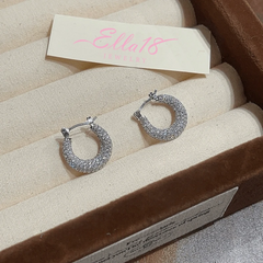 Close-up detail of the sparkling zircons and plating on the Hoop Earrings