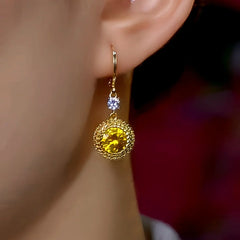 Close-up detail of the sparkling zircons and plating on the Zircon Dangle Earrings